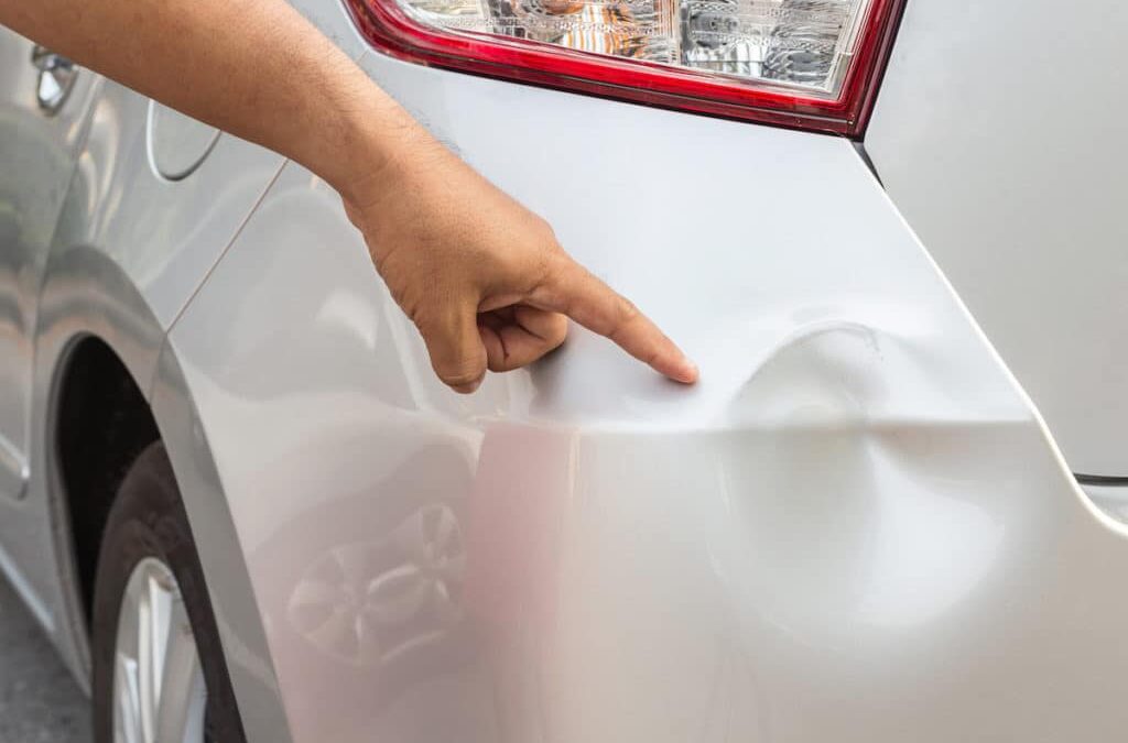 How to Pull Out a Dent in a Fender Without Professional Help